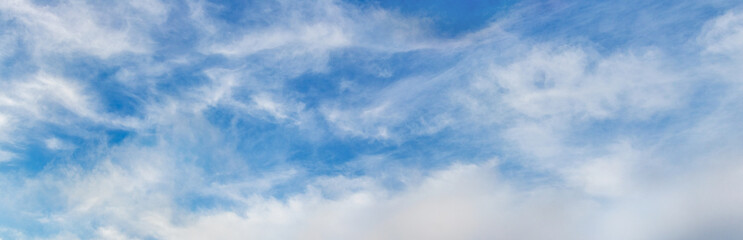 White  clouds in the blue sky in sunny weather