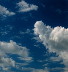 White clouds in deep blue sky