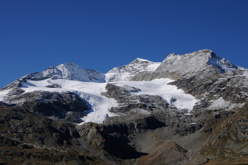 Fototapeta na wymiar Global Climate Change: Melting glaciers at Bernina Pass in the swiss alps in the upper Engadin