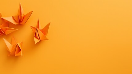 Set of origami paper art make on shinning orange surface