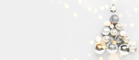 Christmas tree made of silver balls on white background with space for text
