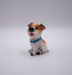 Figure of a dog on a white background