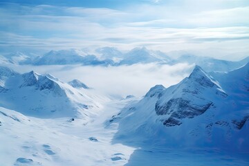Obraz premium Snowy peaks pierce clouds under a clear blue sky.