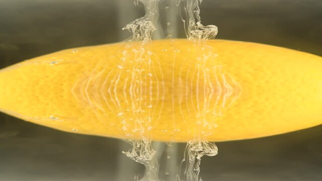 Whispy White Traces move  from a long yellow object as it glides to the right. Intriguing. Made from a closeup video, all natural. 
