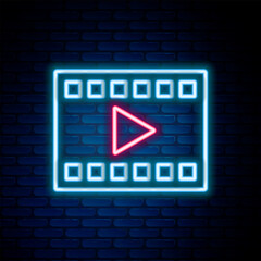 Glowing neon line Play Video icon isolated on brick wall background. Film strip with play sign. Colorful outline concept. Vector