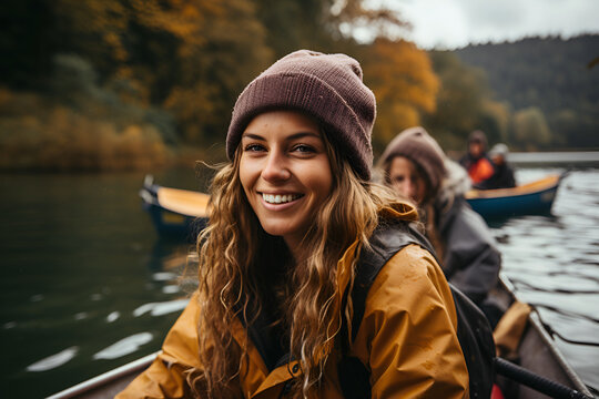 Beautiful girl in on a paddle board on the lake