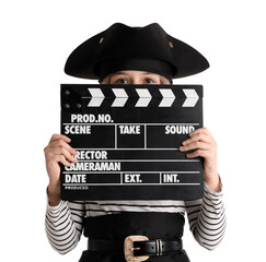 Little actor dressed as pirate with movie clapper on white background
