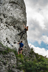 Rock climbing, great time with family - obrazy, fototapety, plakaty