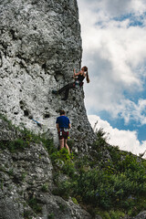 Rock climbing, great time with family - obrazy, fototapety, plakaty