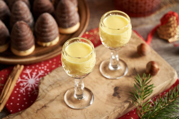 Two glasses of eggnog with wasp nests or beehives - Czech Christmas cookies