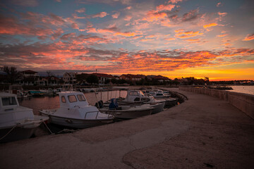 Different fishing boats moored at the Privlaka bay, Croatia, with the sun just about to rise. Epic...
