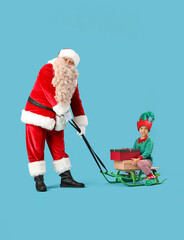 Santa Claus and cute little elf with Christmas gifts sledding on blue background