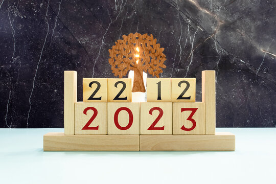 Vintage photo, December 22th. Date of 22 December on wooden cube calendar, copy space for text on board.