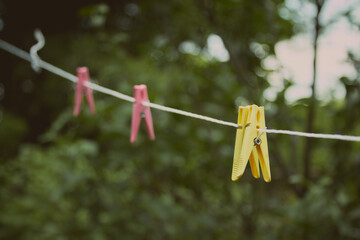 Fototapeta na wymiar Close-up of colorful laundry pins. High quality photo
