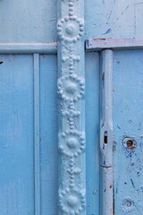 Blue painted wooden door on a house near the Tunis souk.