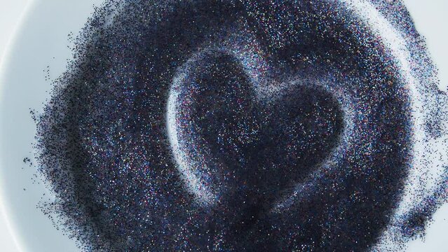 Blue glitter vintage lights background. Valentines day, shiny and glitter hearts, valentine and marriage concept. Heart background. Blue silver sequins.