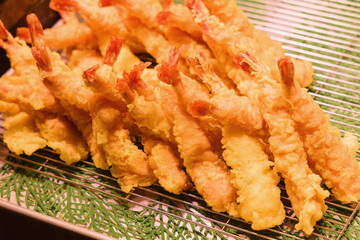 pile of Japanese shrimps tempura on a grid