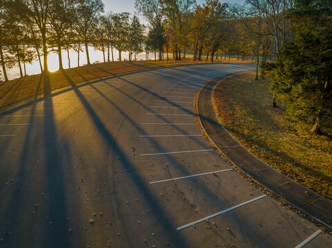 sunrise over the Tennessee RIver and parking lot in Colbert Ferry Park, Natchez Trace Parkway, aerial view of fall scenery