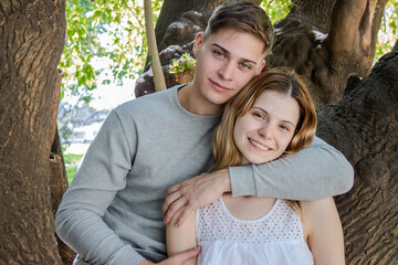 boy hugging his girlfriend