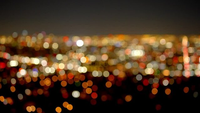 Blurred Los Angeles city lights background at night - travel photography