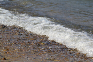 Close up of an ocean wave at a beach