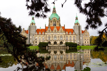 New Town Hall of Hannover city with reflecting and trees around. Lower Saxony, Germany