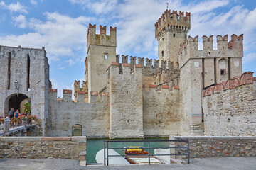 Beautiful view of the castle in Sirmone (Castello Scaligero di Sirmione) on Lake Garda. Province of...