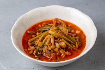 Spinach head dish or spinach head soup. It is a local dish. This dish, which is made in Adana, Turkey, is also sour. Turkish name; ispanak basi corbasi or yemegi