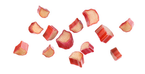 Pieces of fresh ripe rhubarb flying on white background