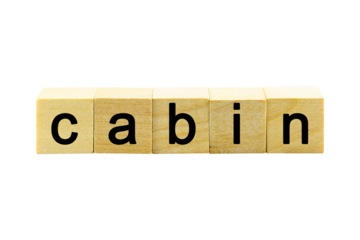 "cabin" text or message short word english letter on a small wooden cubes block with white background.