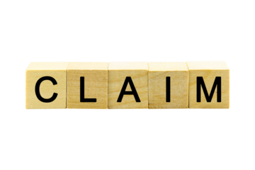 "CLAIM" text or message short word english letter on a small wooden cubes block with white background.