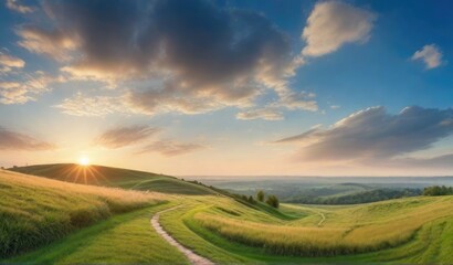 Obraz premium Panoramic natural landscape with green grass field, blue sky with clouds and mountains in background.