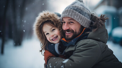 Obraz premium dad with daughter outdoor in winter