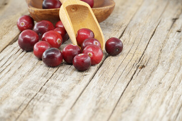 Kitchen scene with fresh cranberries on rustic table