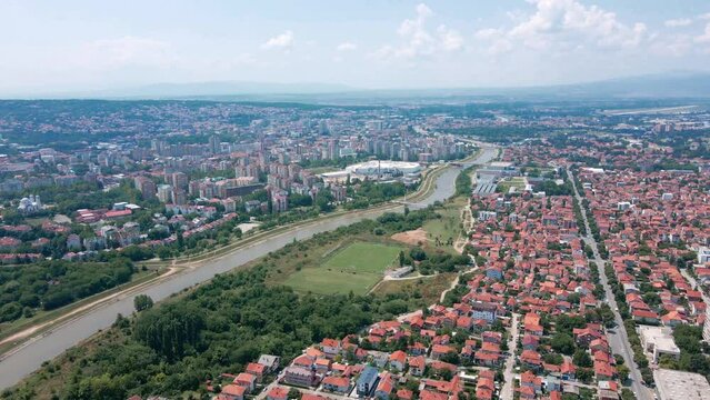 Aerial view of river Nisava in city of Nis, Serbia and surrounding houses and buildings