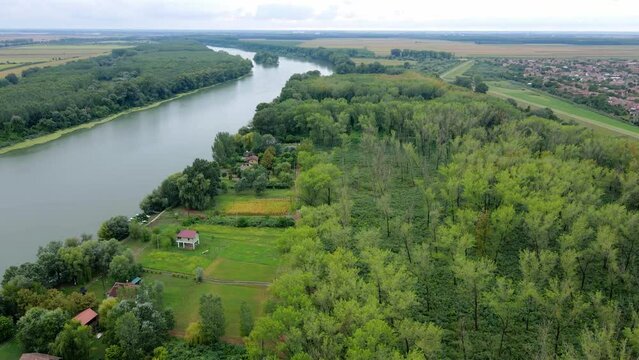 Aerial footage of woodland surrounding Tisza river in Novi Becej, Serbia