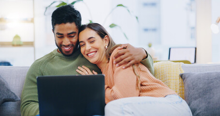 Couple, love and smile with laptop on sofa to watch movies, comedy subscription and online shopping...