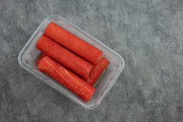 Seedless watermelon make to cylindrical for easy eating arrangement in box. Top view