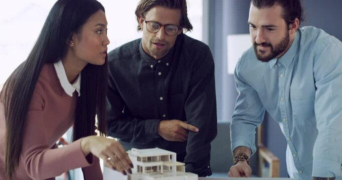 Talking, laptop or architect team work on model 3D house, condominium or real estate development, planning or project. Business group on architecture, property design or condo building infrastructure
