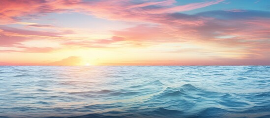 Naklejka premium As the sun sets over the endless horizon, the turquoise waves of the vast ocean reflect the colors of a beautiful, colorful marine life, captivating anyone who embraces the beauty of nature and its