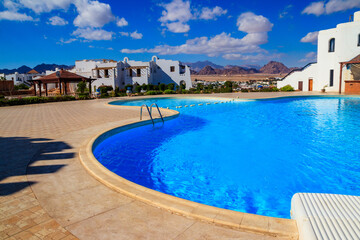Fototapeta na wymiar Swimming pool at hotel in Sharm el Sheikh, Egypt