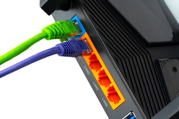 Modern router with cables plugged in close up