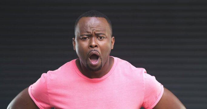 Surprise, news and face of man with horror, shock and announcement in studio or black background. Wtf, emoji and portrait of African person in disaster, crisis or omg reaction to crazy gossip