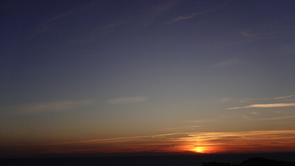 Beautiful image of the sunset at the ocean horizon