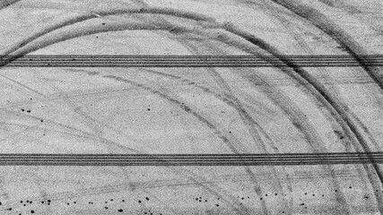 Aerial view tire track mark on asphalt tarmac road race track texture and background, Abstract...