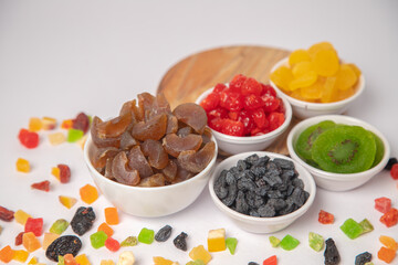 Mixed nuts on white bowl with white background, mixed dry fruits and nuts on white bowl with white background