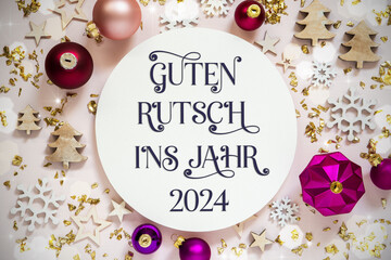 Fototapeta na wymiar Text Guten Rutsch 2024, Means Happy 2024, Purple Flatlay Christmas Decor