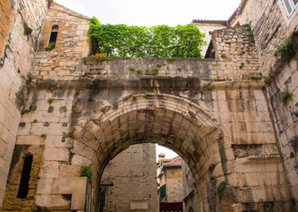 Fototapeta na wymiar The interior arch of the 4th century Golden Gate in the historic city walls of Split in Croatia. Part of the Diocletian Palace. Also called Zlatna Vrata, Porta Aurea or Northern Gate