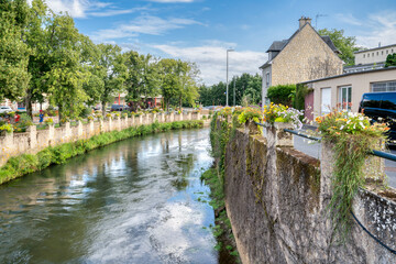 Fototapeta na wymiar River in sweet Village in Normandy flower