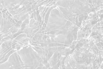 Poster White water with ripples on the surface. Defocus blurred transparent white colored clear calm water surface texture with splashes and bubbles. Water waves with shining pattern texture background. © Water 💧 Shining 📸